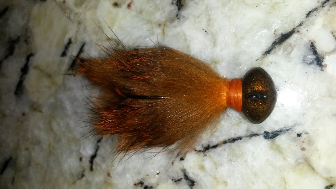 Learn to make DIY bass and walleye jigs using rabbit fur for those